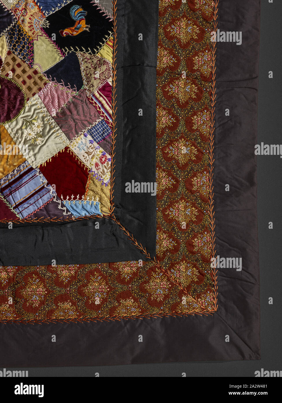 crazy quilt, Unknown, about 1885, silk, velvet, ribbons, synthetic fabric, pieced and embroidered, 85-1/2 x 81-3/4 in., American, Textile and Fashion Arts Stock Photo