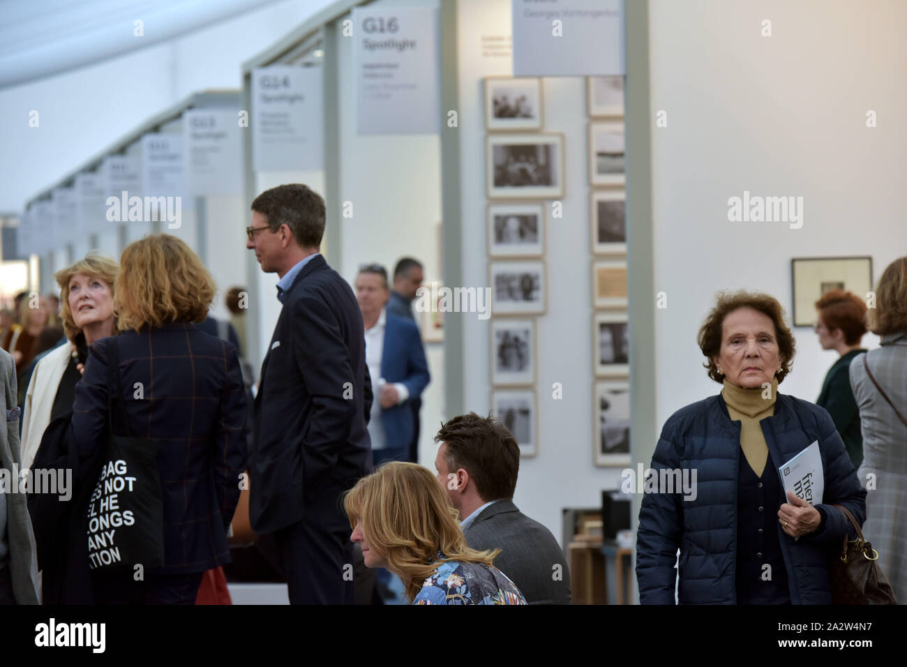 Members of the public, art lovers and collectors attend the opening day of the art fair Freize Masters in Regent's Park, London, where galleries from Stock Photo