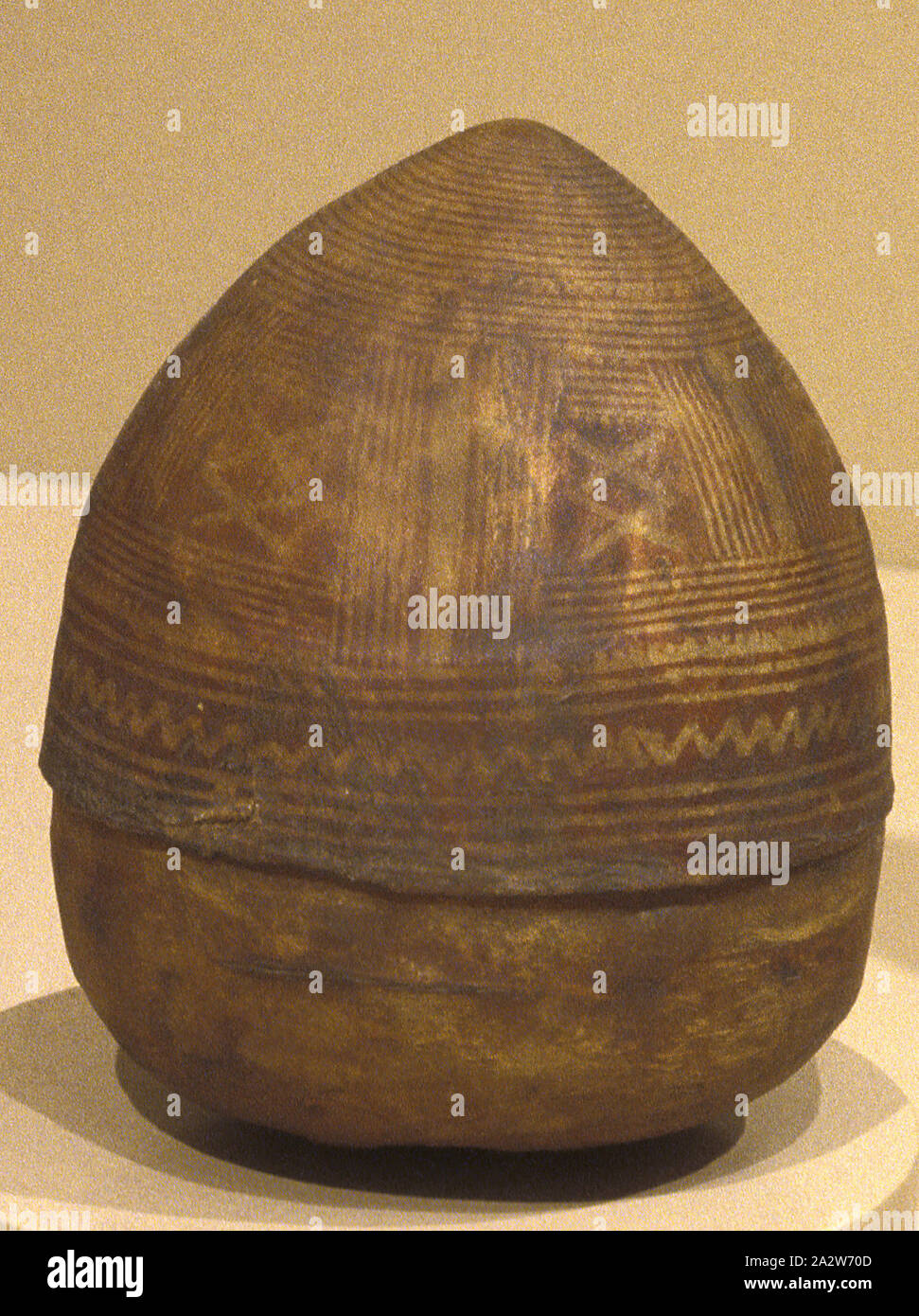 spice container, Unknown, 1901-1997, hide, pigment, 5-1/2 x 4-7/8 x 4-3/4 in., African Art Stock Photo