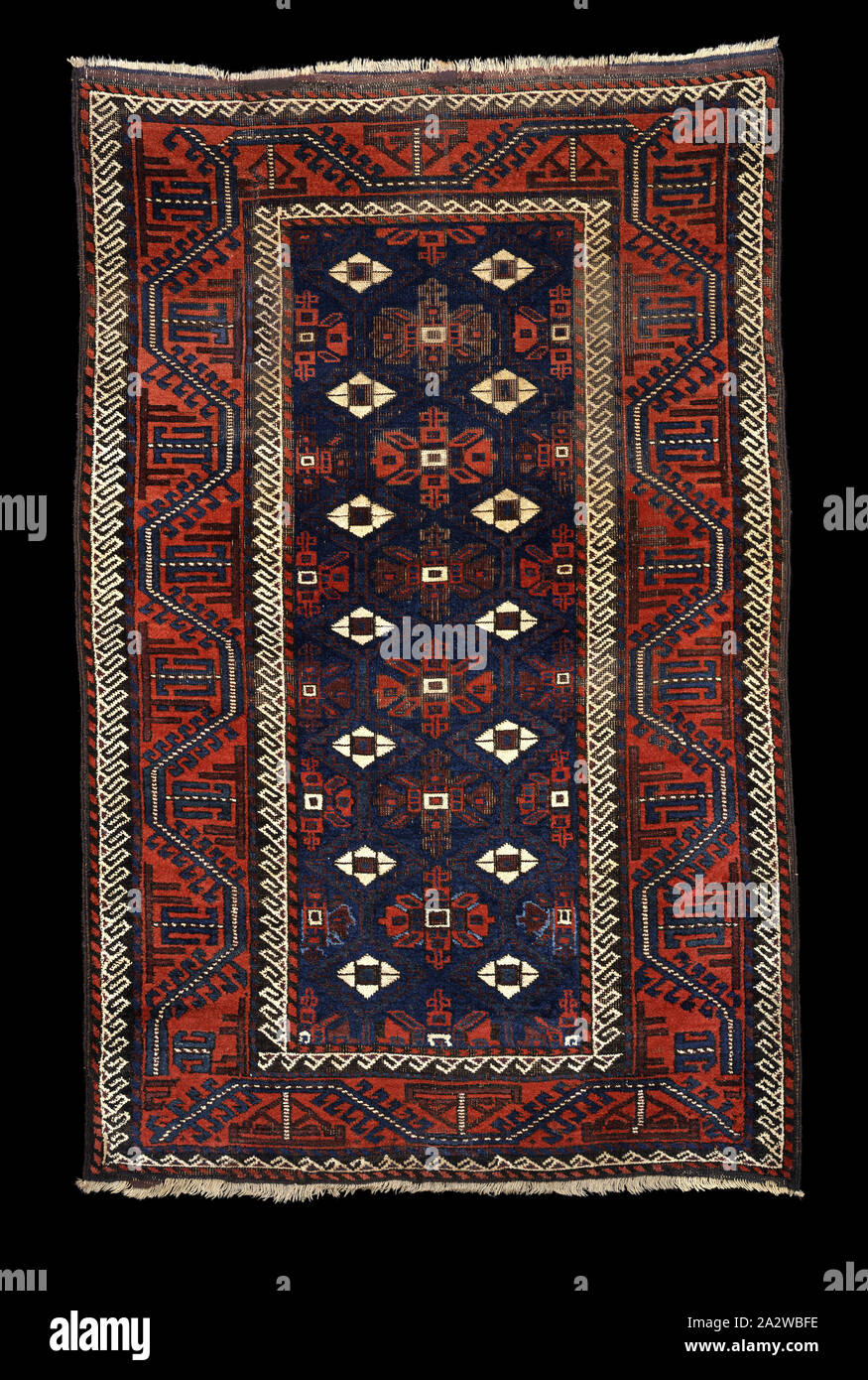 rug, Baluchi people, 1850s, wool, 44 x 69 in., Textile and Fashion Arts Stock Photo