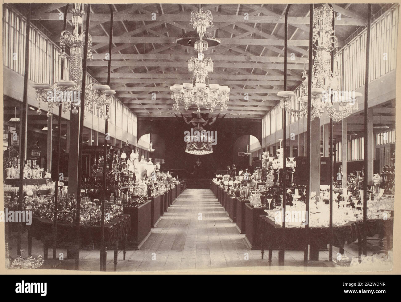 Photograph - Austrian Court, Main Avenue, Exhibition Building, 1880-1881, View looking westwards through the Austrian Court in the central temporary annexe on the western side of the main avenue at the 1880 Melbourne International Exhibition held at the Exhibition Buildings, Carlton Gardens, between 1 October 1880 and 30 April 1881. In addition to the main permanent Exhibition Building, two permanent annexes as well as a large, central wooden temporary annexe Stock Photo