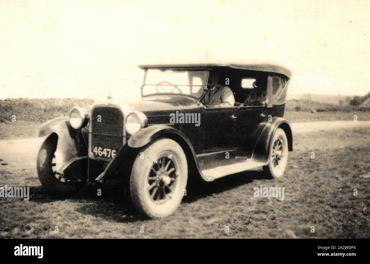 Photograph - by Jack Walton, Ballan, Victoria, circa 1920s-1930s, Couple in a motor car reg no 46476 Stock Photo