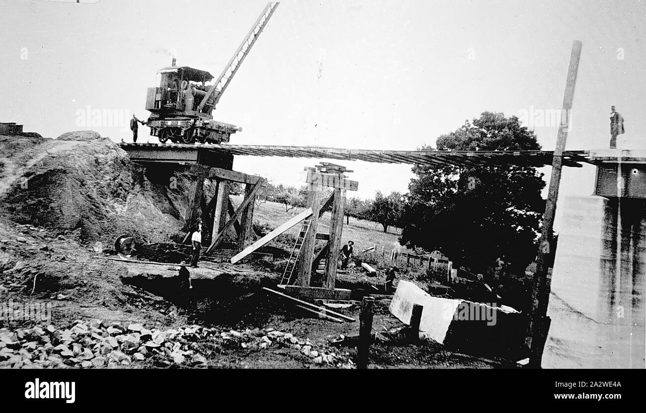 Negative - Darnum District, Victoria, 1934, A mobile crane used to rebuild a railway bridge after flood damage Stock Photo