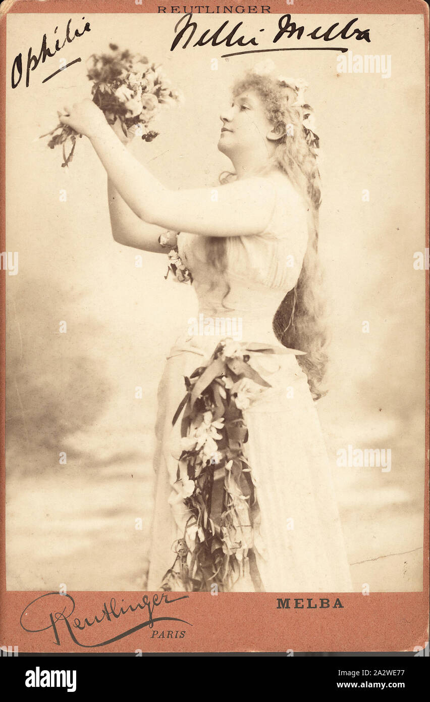 Cabinet Card - Dame Nellie Melba as Ophelia in Hamlet, circa 1890, Cabinet card featuring photograph of Dame Nellie Melba as Ophelia in 'Hamlet', and signed by Melba. It was produced by Reutlinger of Paris, around 1890. The cabinet card was a style of photograph universally adopted for photographic portraiture in 1870 and over time reflect changing trends in photographic processes. It consisted of a thin photograph that was generally mounted on card Stock Photo