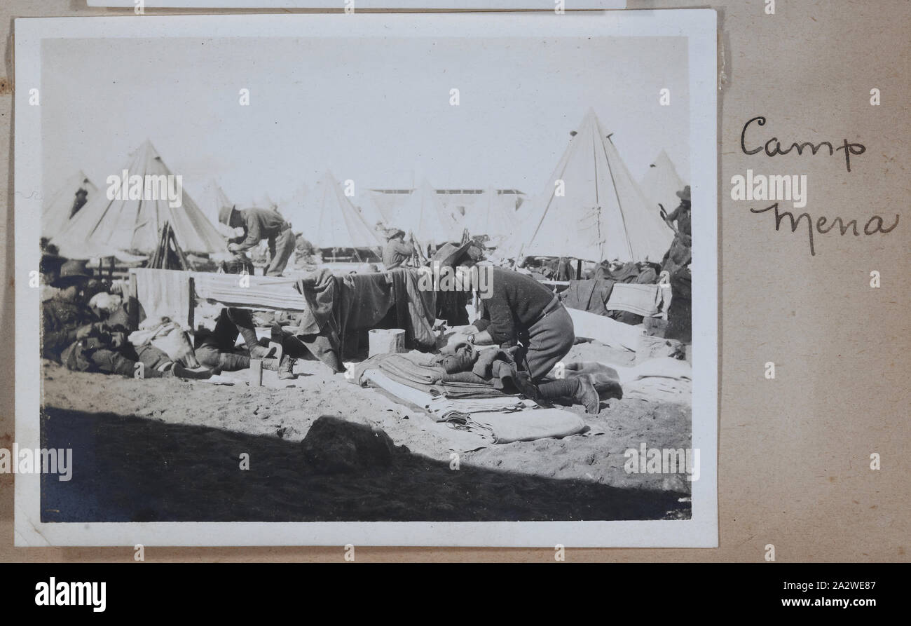 Photograph - 'Camp Mena', Egypt, Captain Edward Albert McKenna, World War I, 1914-1915, One of 139 photographs in an album from World War I likely to have been taken by Captain Edward Albert McKenna. The photographs include the 7th Battalion training in Mena Camp, Egypt, and sight-seeing. Image depicting men sorting through belongings at Mena Camp, Egypt. Mena Camp was one of three training camps in Egypt that were used by the A.I.F. and the N.Z.E.F Stock Photo