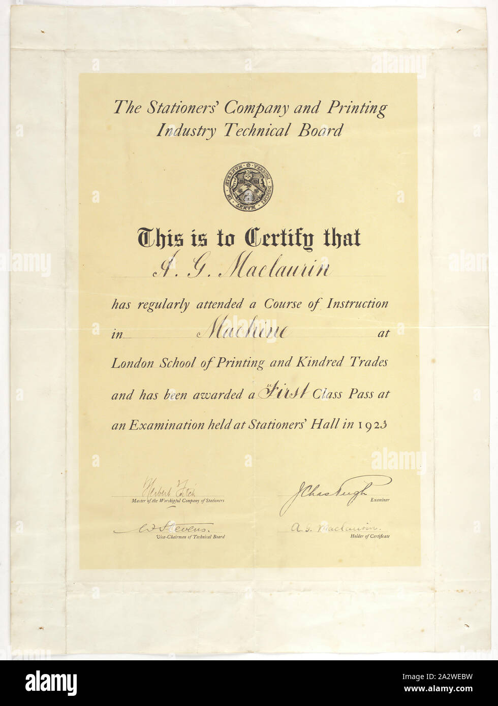 Certificate - Machine, First Class Pass, Issued to AG Maclaurin, 1923, Certificate issued to AG Maclaurin by the Stationers' Company and Printing Industry Technical Board in 1923. Certifying that he was awarded a First Class pass for his 'Machine' course. Archibald Gordon Maclaurin was born in 1904 in Westham London. He trained as a printer and sought work in Australia as there were few opportunities in England; he migrated on the 'Jervis Bay' in 1928. Before Stock Photo