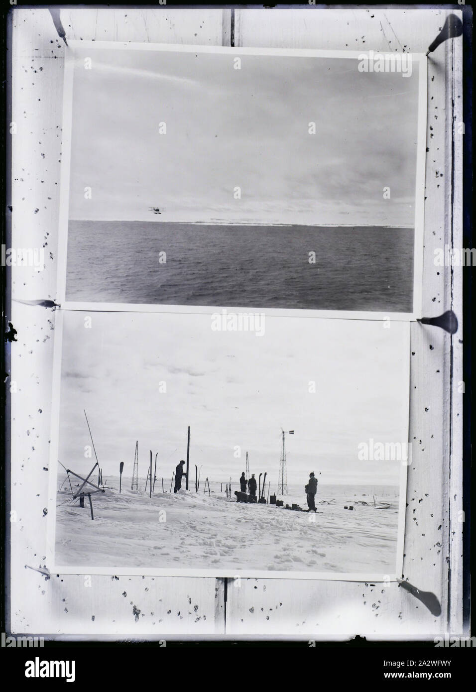 Glass Negative - Copy, 'Reconnaissance Flight' & 'Little America', Ellsworth Relief Expedition, Antarctica, 1935-1936, Black and white glass negative of two images, 'Reconnaissance Flight' & 'Little America', Ellsworth Relief Expedition, Antarctica. One of 328 images in various formats including artworks, photographs, glass negatives and lantern slides Stock Photo