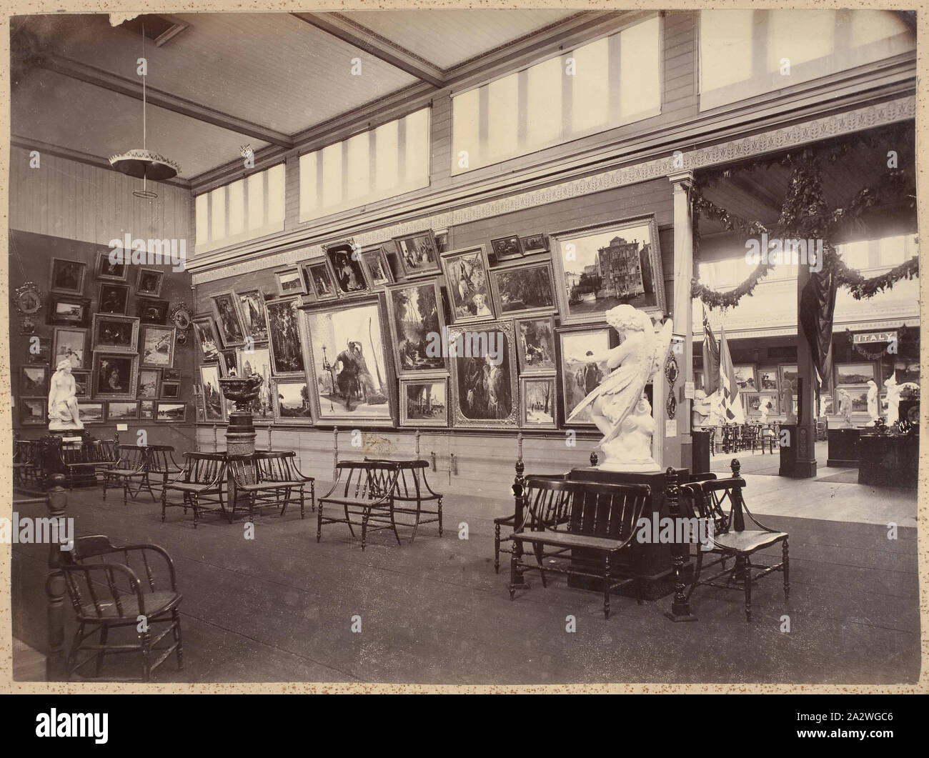 Photograph - Italian Court, Fine Art Gallery, Great Hall, Exhibition Building, 1880-1881, View of the Italian Fine Art Gallery display on the southern wall of the eastern nave, and extending across the eastern balcony, in the Great Hall at the 1880 Melbourne International Exhibition held at the Exhibition Buildings, Carlton Gardens, between 1 October 1880 and 30 April 1881. The picture galleries of the various countries were situated on the first floor balconies of the main Exhibition Stock Photo