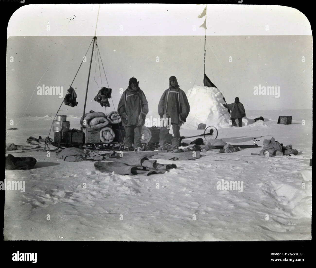 Lantern Slide - British Imperial Antarctic Expedition, Adams, Wild, Shackleton at Campsite, Antarctica, Jan 1909, Photograph depicting members of the British Imperial Antarctic Expedition, Jameson Adams, Frank Wild and Ernest Shackleton, at a supply depot in Antarctica on January 1909. The image was taken by Eric Marshall on their return journey from their farthest south position of 88º23'S Stock Photo