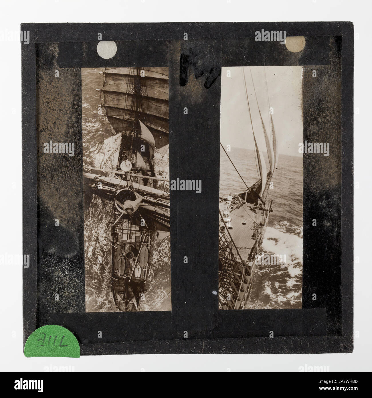 Lantern Slide - 'Captain Hurley in the Barrel', BANZARE Voyage 1, Antarctica, 1929-1930, Lantern slide of the ship Discovery, Antarctica. One of 328 images in various formats including artworks, photographs, glass negatives and lantern slides Stock Photo