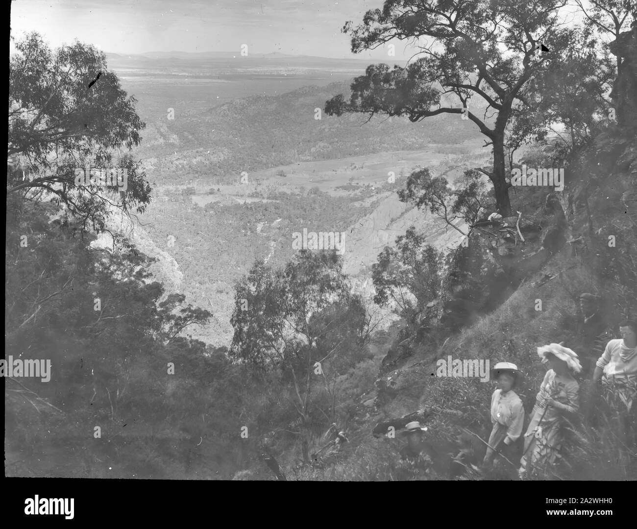 Lantern Slide - Dandenongs, Victoria, Date Unknown, Black and white image of people exploring the western face of the Dandenongs around the Kilsyth/Montrose area, overlooking Mt Disappointment in the distance, photographed by A.J. Campbell Stock Photo