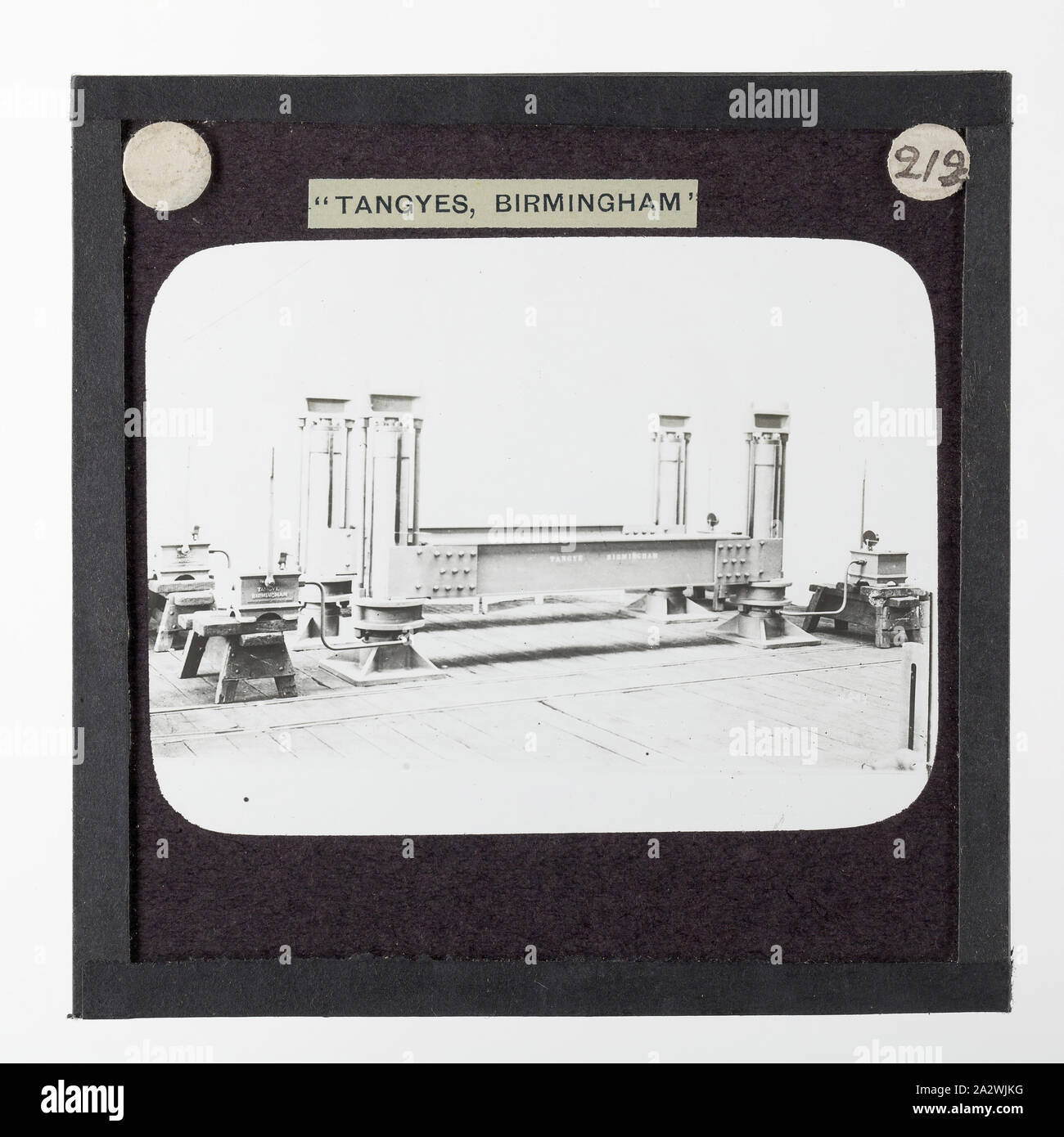 Lantern Slide - Tangyes Ltd, Beam Lifting Jack, circa 1910, One of 239 glass lantern slides depicting products manufactured by Tangyes Limited engineers of Birmingham, England. The images include various products such as engines, centrifugal pumps, hydraulic pumps, gas producers, materials testing machines, presses, machine tools, hydraulic jacks etc. Tangyes was a company which operated from 1857 to 1957. They produced a wide variety of engineering Stock Photo