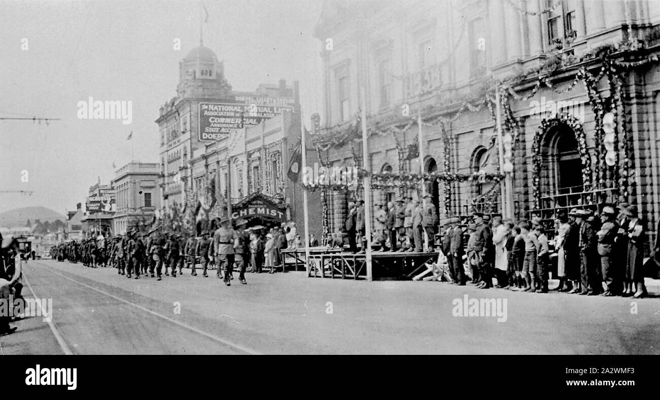 Negative - Procession Passing Review Stage Outside the Town Hall During Centenary Celebrations, Ballarat, Victoria, 1938, Procession moving past the review point outside the Ballarat Town Hall during the Ballarat centenary celebrations. Mt Warrenheip is in the background Stock Photo
