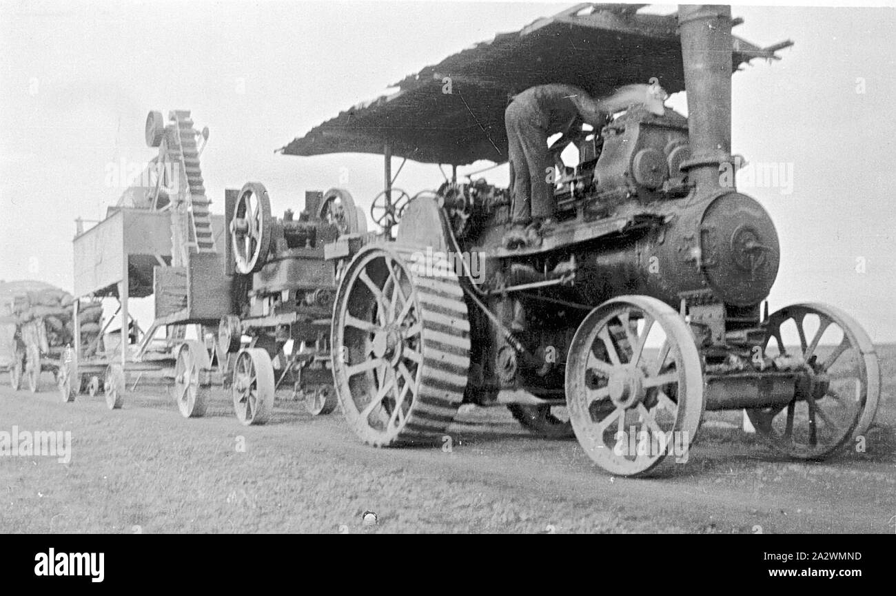 Negative - Steam Traction Engine, Grenville District, Victoria, circa 1930, Man working on a Fowler steam traction engine Stock Photo