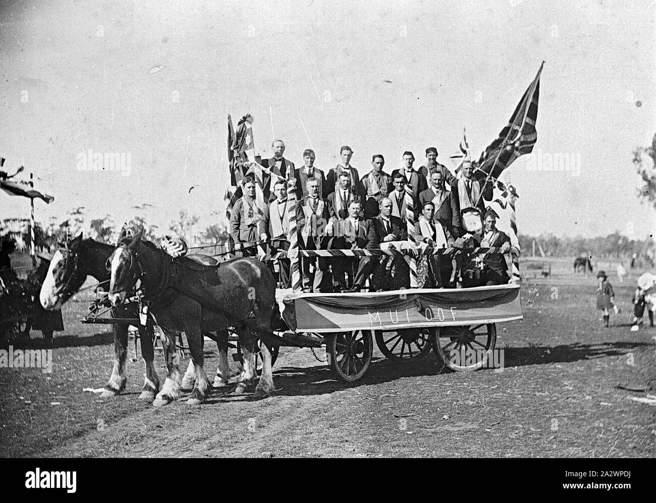 Negative - Merbein, Victoria, 1920, Members of the I.O.O.F. on a parade float drawn by two horses Stock Photo