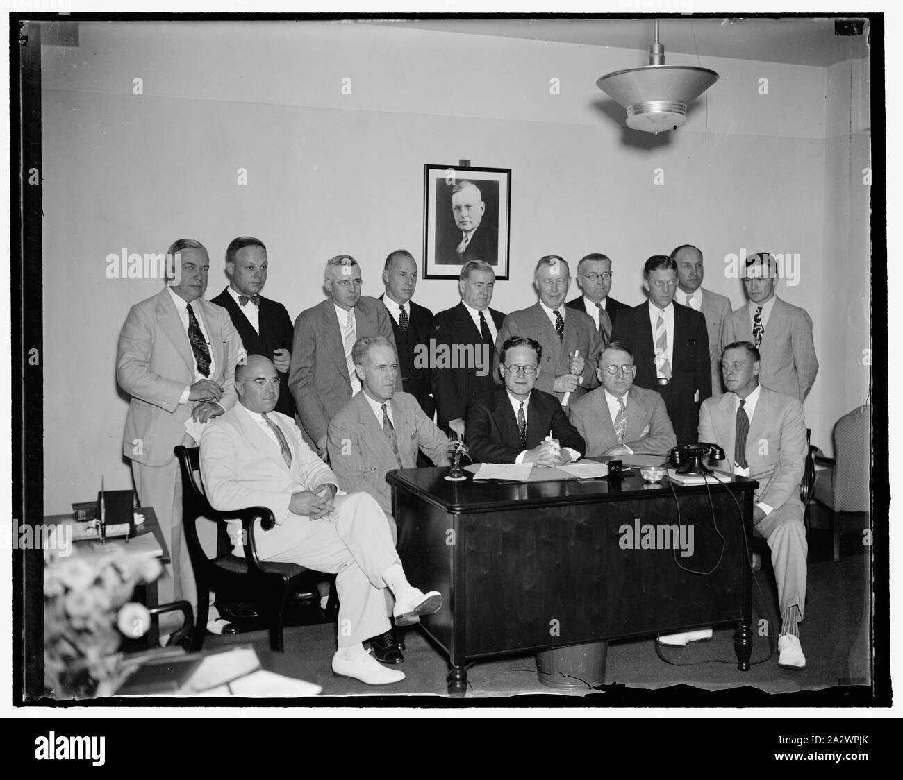 Republicans start ball rolling for 1938. Washington, D.C. Aug. 24. Looking forward to the 1938 Congressional elections, Chairman John Hamilton of the Republican National Committee met today with Republican State Chairmen from some fifteen states to map out an organization plan. In the photograph, left to right: (seated) Lyle Jackson, Nebraska; Harlan J. Bashfield, South Dakota; Chairman Hamilton; James C. Farmer, New Hampshire; and Pierce Brereton, Rhode Island. Standing, left to right: William S. Murray, New York; Ed. D. Schorr, Ohio; James E. Thomson, Michigan; Sinclair Weeks, Massachusetts; Stock Photo