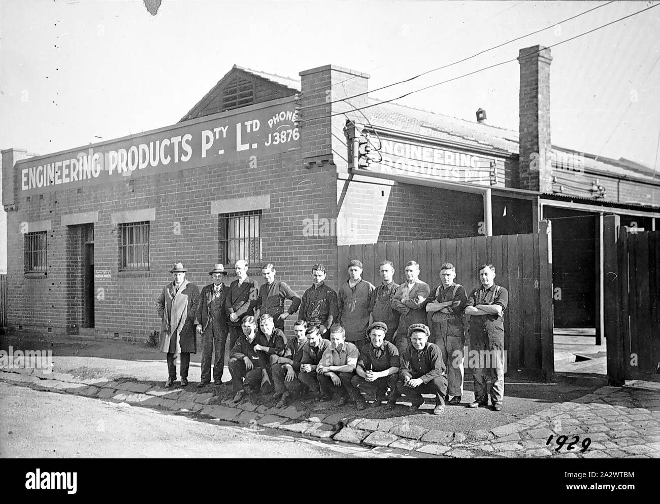 Negative - Workers Outside Factory, Engineering Products Pty Ltd, Richmond, Victoria, 1929, Workers outside the factory of Engineering Products Proprietary Limited Stock Photo