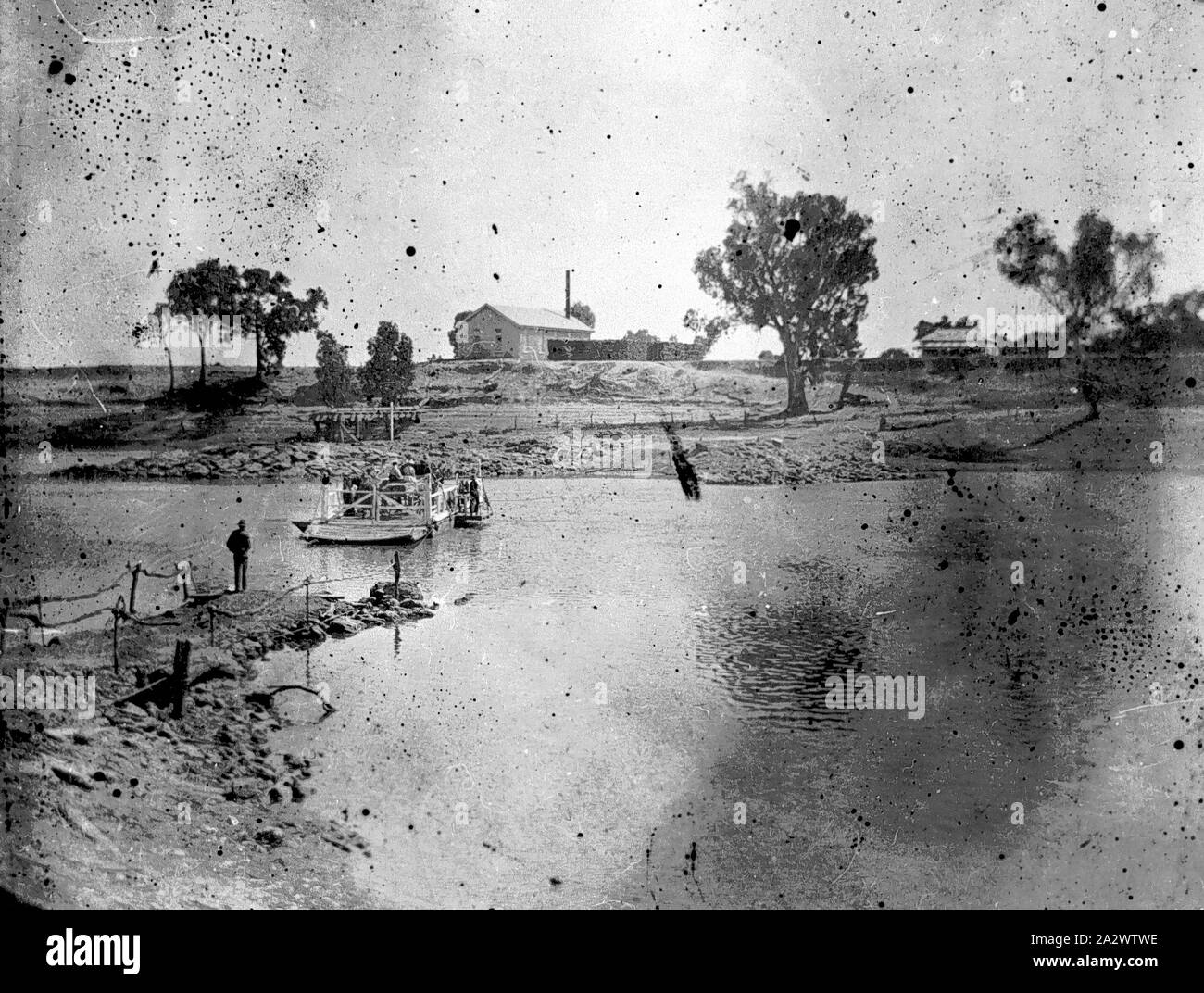 Negative - Psyche, Victoria, circa 1905, A punt crossing the Murray River. The river appears to be extremely low Stock Photo