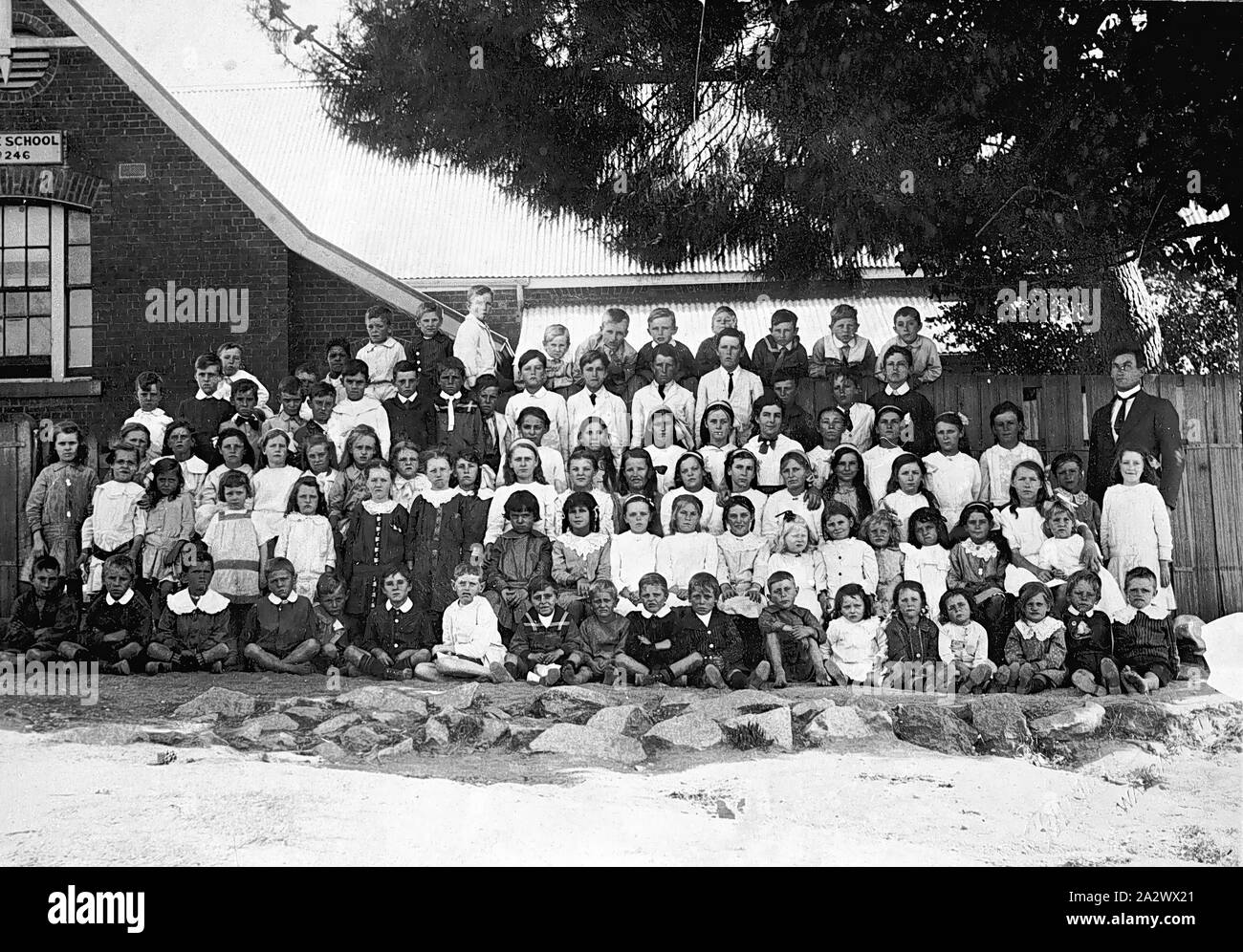 Negative - Eldorado, Victoria, circa 1905, A teacher and pupils in front of the Eldorado State School No.246 Stock Photo