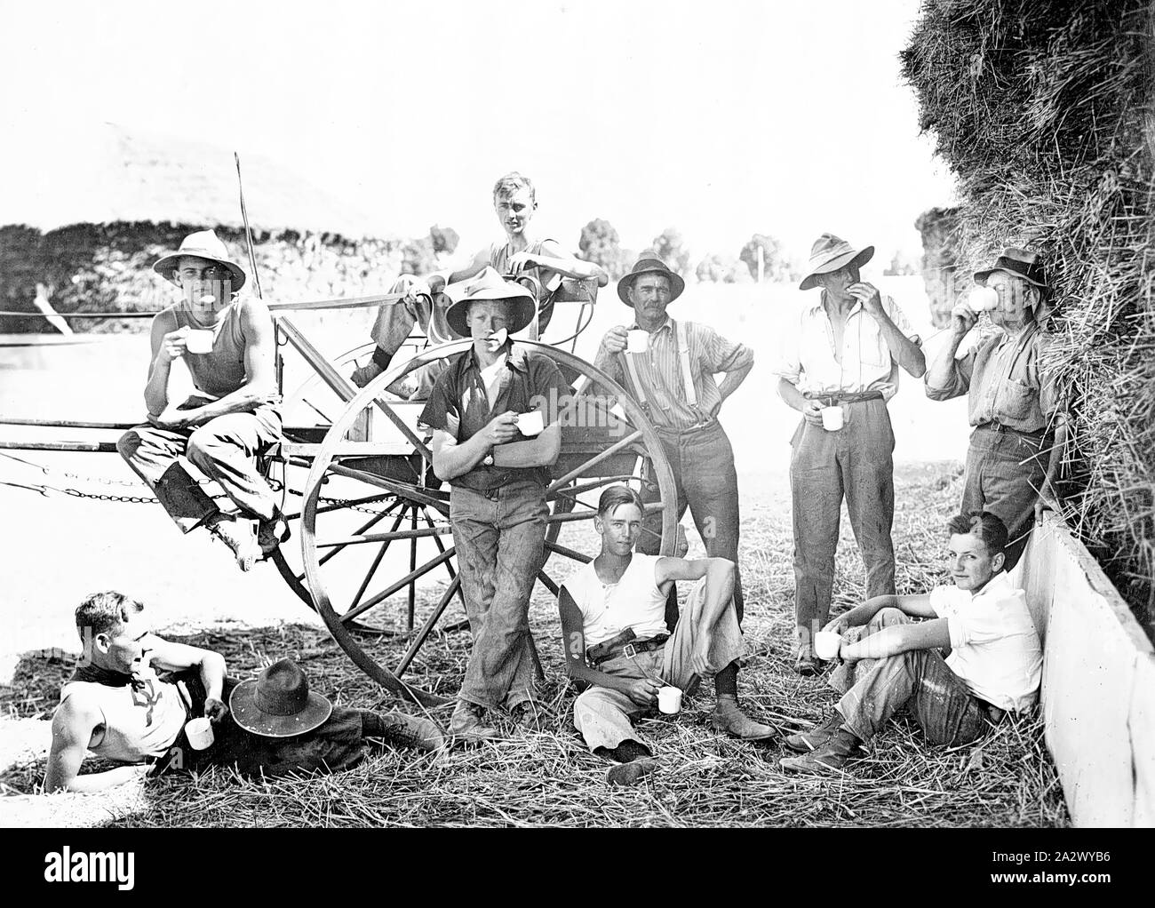 Negative - Students, Longerenong Agricultural College, Dooen, Victoria, 1923, Students taking a tea break by a haystack at the Longerenong Agricultural College Stock Photo