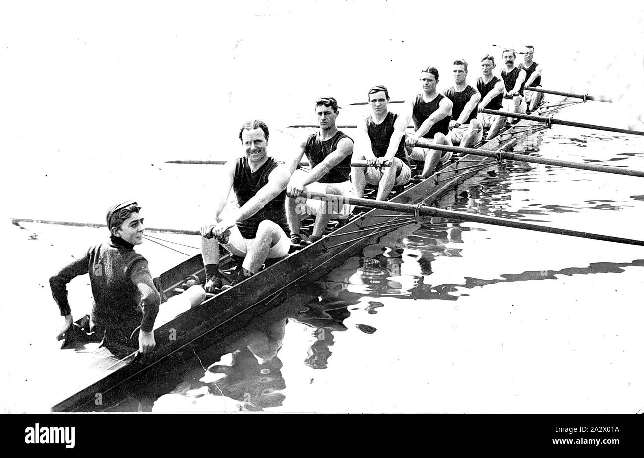 Negative - Bairnsdale District, Victoria, 1910, A rowing crew in a boat. Believed to be a double maiden eight, Bairnsdale & Sale, Easter, 1910 Stock Photo