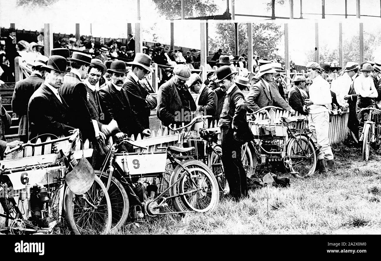 Negative Victoria, circa 1910, Motorcycle race meeting. The motorcycles are leaning against a