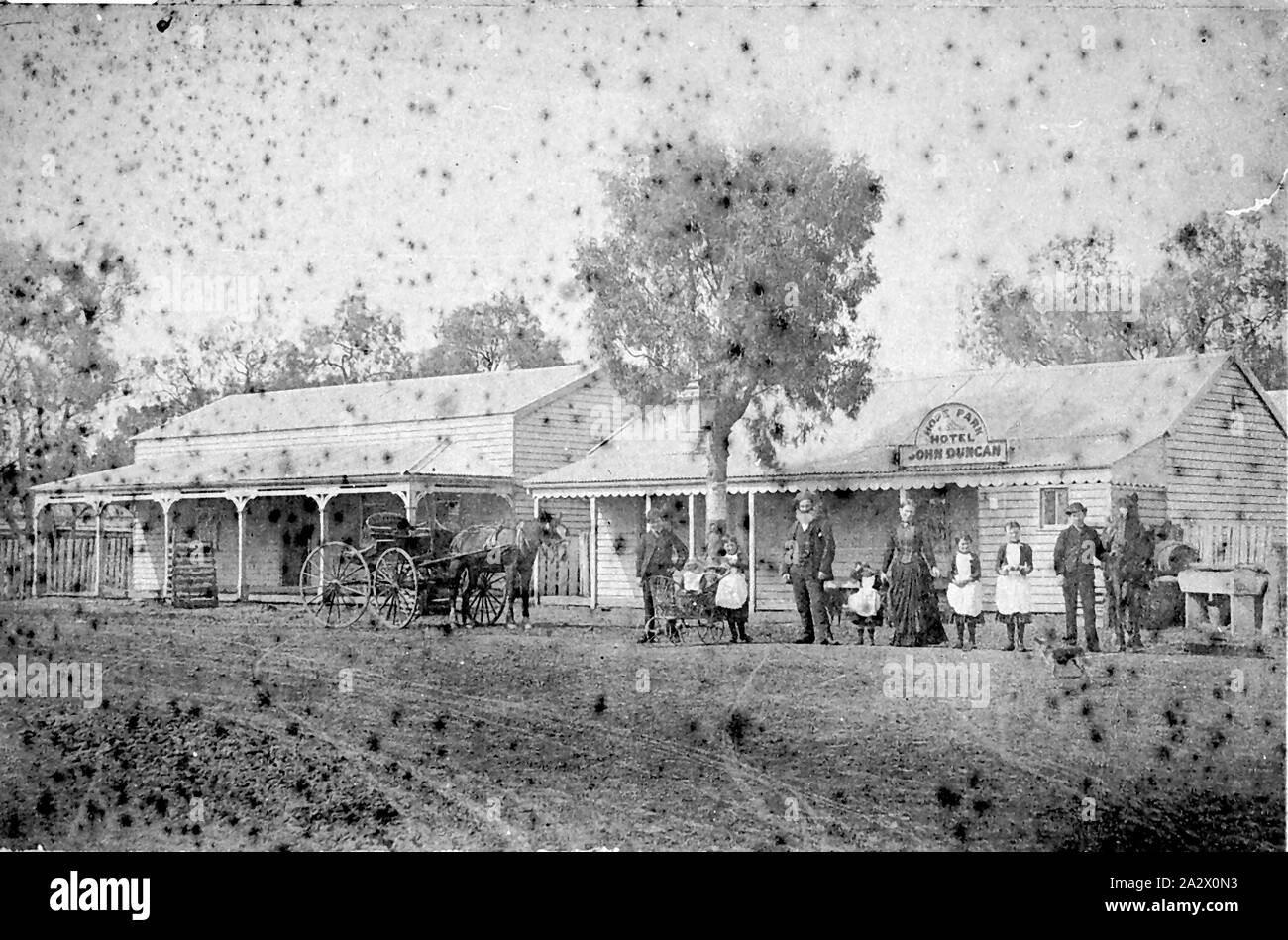 Negative - Dingee, Victoria, circa 1885, Family in front of the Hope Park Hotel. There is a horse and buggy on the left Stock Photo