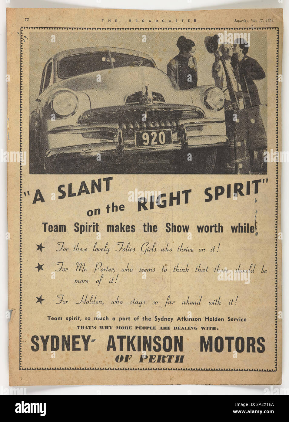 Newspaper Advertisement - Holden Cars at Sydney-Atkinson Motors, Perth, The Broadcaster, 17 Jul 1954, Clipping of an advertisement for Holden cars at Sydney-Atkinson Motors, Perth, published in The Broadcaster, 17 July 1954. One of the models is Bernice Kopple (kissing the porter) who had migrated from Scotland to Australia, in December 1950 onboard the ship New Australia'. Bernice Kopple was born in Glasgow, Scotland in 1930 and migrated to Melbourne onboard the ship New Australia in 1950 Stock Photo