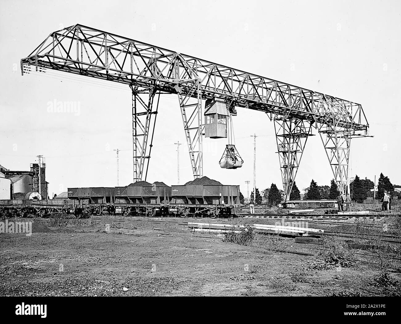 Negative - Newport, Victoria, pre 1918, Using an overhead travelling crane to unload coal from railway trucks at the Newport Power House Stock Photo