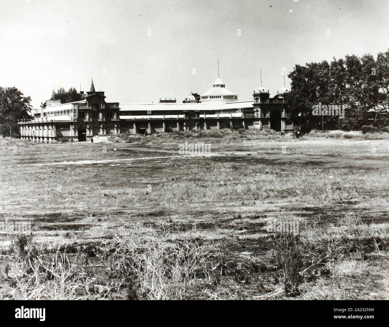 Photograph - Eastern Annexe, Exhibition Building, Melbourne, 1947, Black & white photograph of the eastern annexe of the Exhibition Building from the north west, taken in 1947. The photograph shows the northern side of the eastern annexe that, at this time, housed the White Ensign Club and Australian War Museum. This is one of 959 photographs (or images) of the Exhibition Building collated by the Exhibition Trustees as a 10 volume pictorial history of Stock Photo