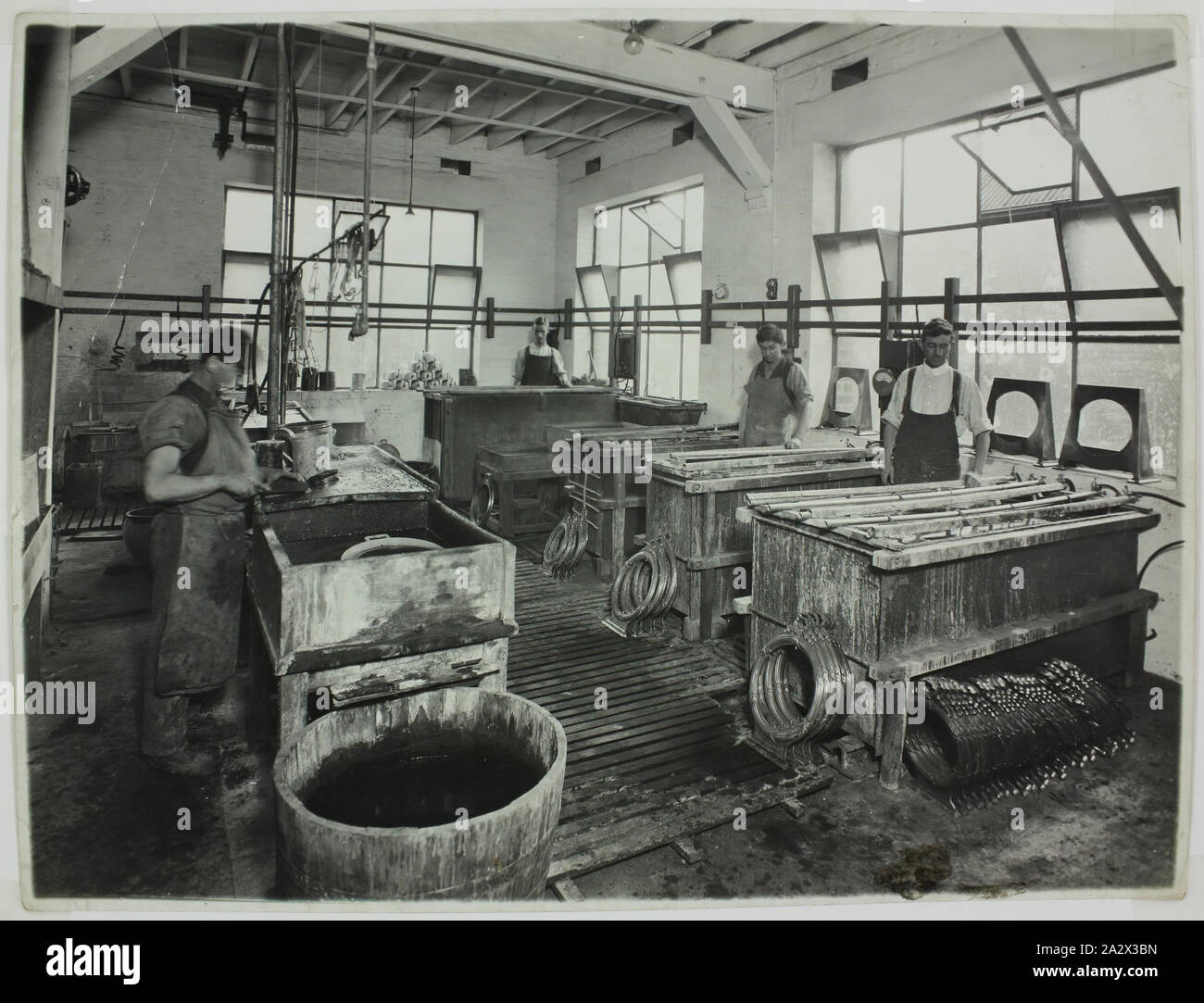Photograph - Hecla Electrics Pty Ltd, Workers Shaping Metal Components ...