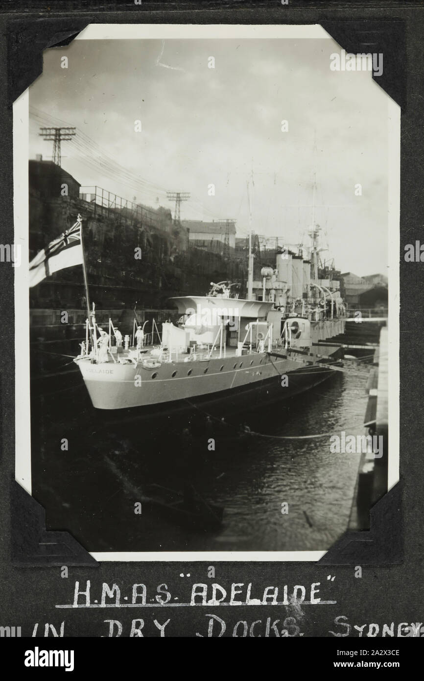 Photograph - 'HMAS Adelaide in Dry Docks Sydney', 1937-1939, Black and white photograph of HMAS Adelaide in Sydney dry docks. One of 48 photographs in a photographic album. Taken by D.R.Goodwin, Royal Australian Navy (R.A.N.) 1937-1939. The images are of H.M.A.S Cerberus and other naval ships, naval training and field gun crews Stock Photo