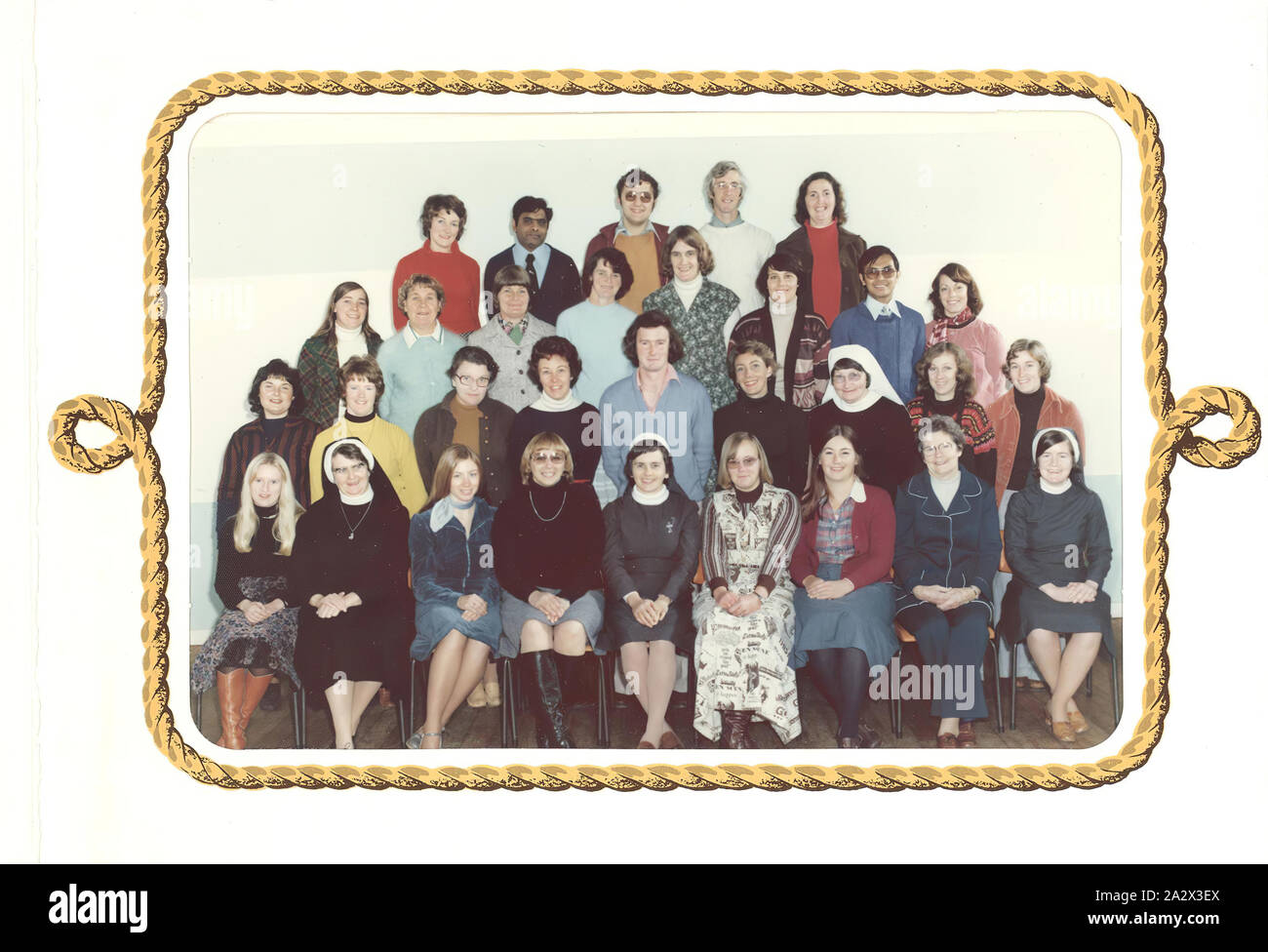 Photograph - Hope Macpherson with other Teachers at Sacred Heart College, Shepparton, Victoria, circa 1977, Colour photograph of teaching staff at Sacred Heart College, Shepparton. Hope Macpherson was employed by Sacred Heart College, Knight Street, Shepparton from commencement of the 1977 school year on a full time basis teaching 74 periods out of 80 per fortnight for an annual salary of $9,115. Hope was the first female curator at National Museum of Victoria Stock Photo