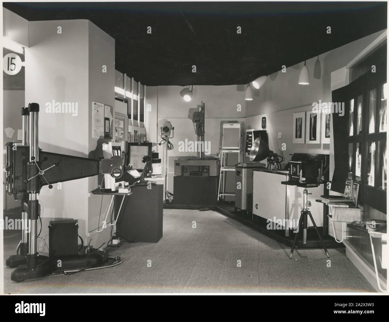 Photograph, Exhibition Stand, Medical Imaging Equipment, circa 1940s, Black and white photograph of a section of a Kodak Australasia Pty Ltd exhibition stand, circa 1940s. This section displays a variety of medical imaging / x-ray equipment including cameras, screens, lighting and film. This photograph is part of the Kodak collection of products, promotional materials, photographs and working life artefacts, when Stock Photo