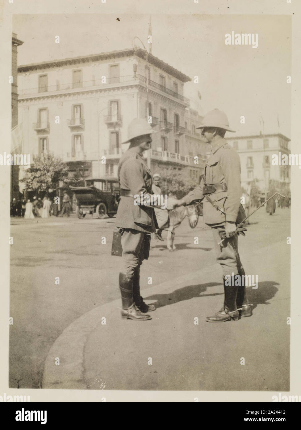 Photograph - Major McNicholl and Captain Finlayson, Egypt, Captain Edward Albert McKenna, World War I, 1914-1915, One of 108 images in an album from World War I likely to have been taken by Captain Edward Albert McKenna. The album contains photographs of the 7th Battalion in Egypt. Image of Major McNicholl and Captain Finlayson meeting in Cairo. Major Walter Ramsey McNicholl was assigned to the Headquarters of the 7th Battalion. He returned to Australia in 1918. Captain Christopher Finlayson was also Stock Photo