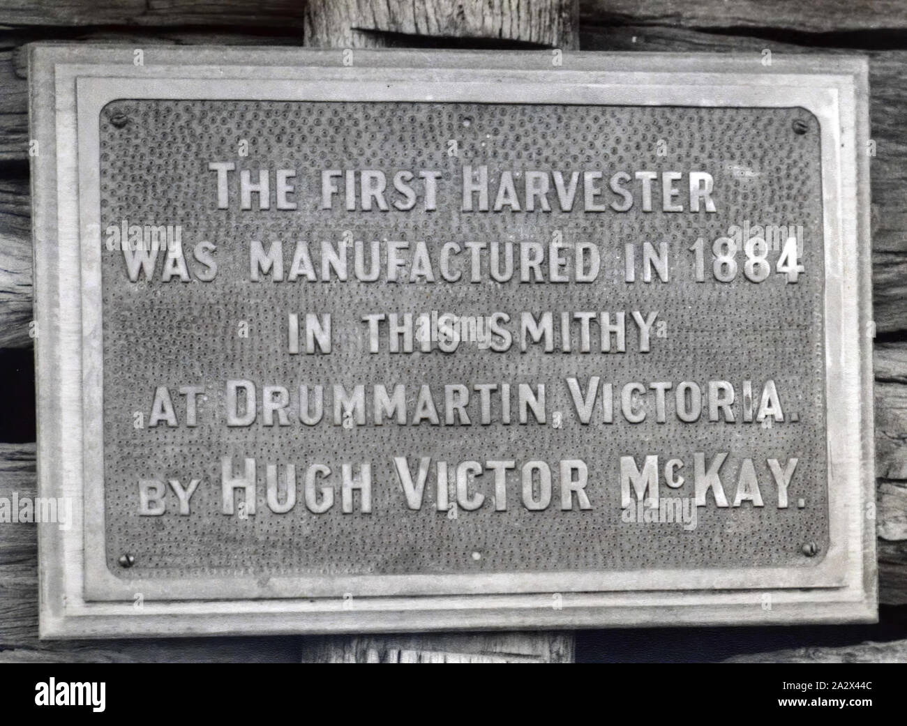 Photograph - Massey Ferguson, Plaque of HV McKay's Original Smithy, Sunshine, Victoria, circa 1928, Photograph of the plaque that was attached to the relocated HV McKay Smithy at Sunshine. part of a collection of photographs, negatives, moving film, artefacts, documents and trade literature belonging to the H. V. McKay Sunshine Collection. The McKay collection is regarded as one of the most significant industrial heritage collections in Australia Stock Photo
