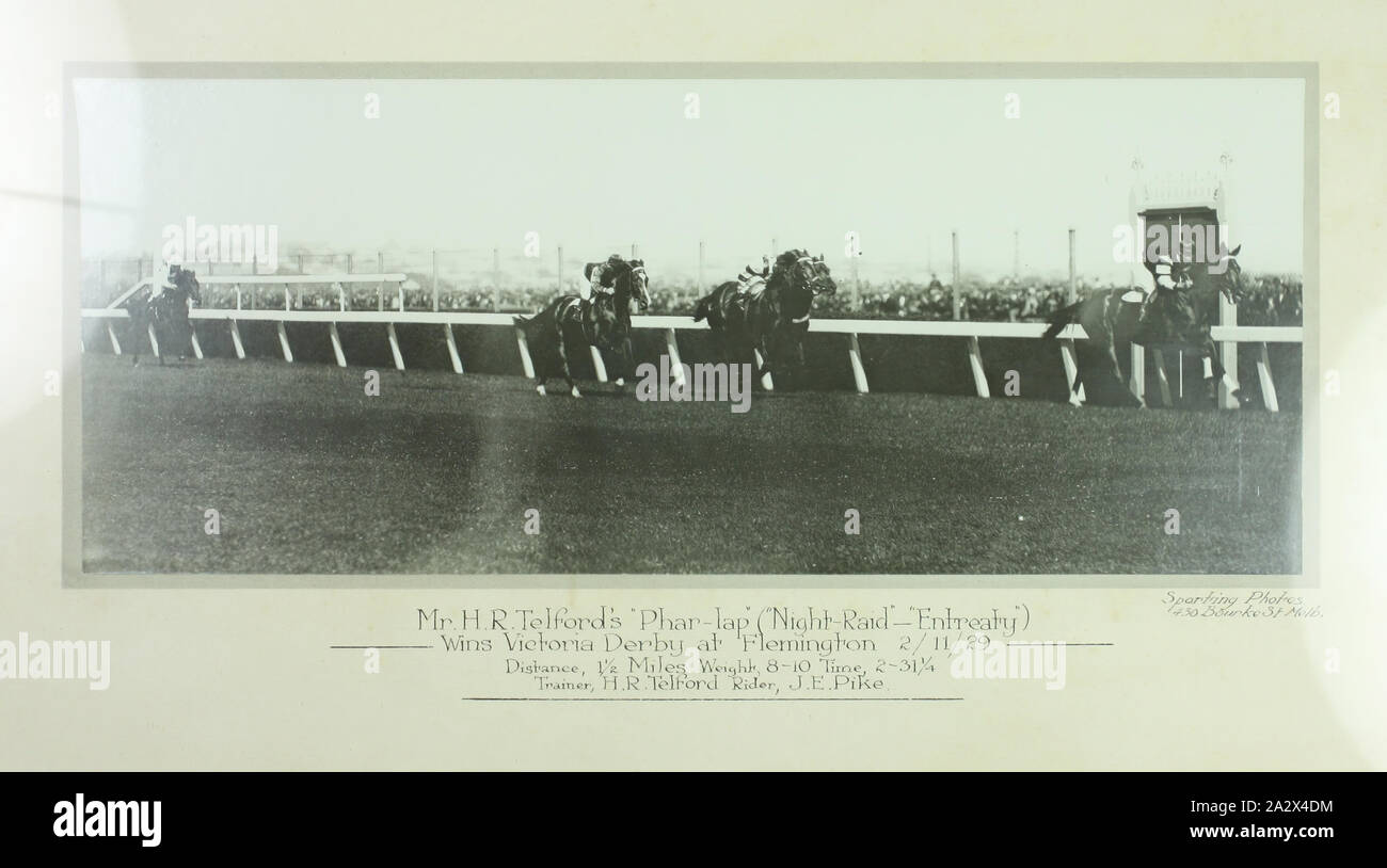 Photograph - Phar Lap Winning Victoria Derby, Framed, 1929, This framed photograph depicts Phar Lap winning the Victoria Derby at Flemington in 1929. It belonged to the family of his trainer Harry Telford family, and was amongst a number of items donated to the museum by them in the 1990s Stock Photo