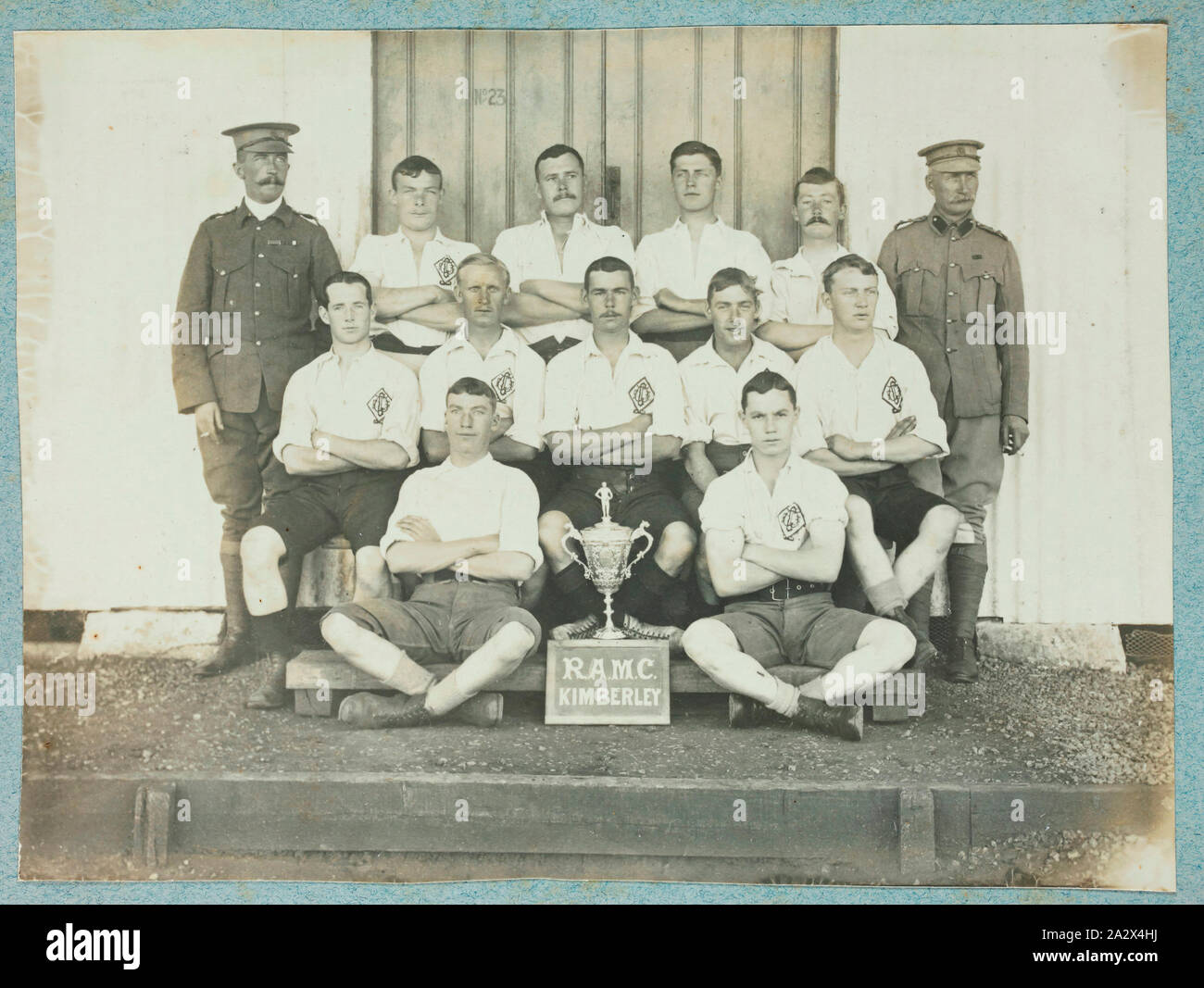 Photograph - Royal Army Medical Corps Sporting Group, Kimberley, South Africa, circa 1902, One of 74 black and white photographs contained within a hard-covered photograph album. Inscribed on front page of the album 'M.G.A. Warner'. Belonged to Sister Mabel Ashton Warner, who served in Queen Alexandra's Royal Nursing Service. Photographs are glued into album, and are generally very faded. Some appear commercially-produced; others are rough and amateurish Stock Photo