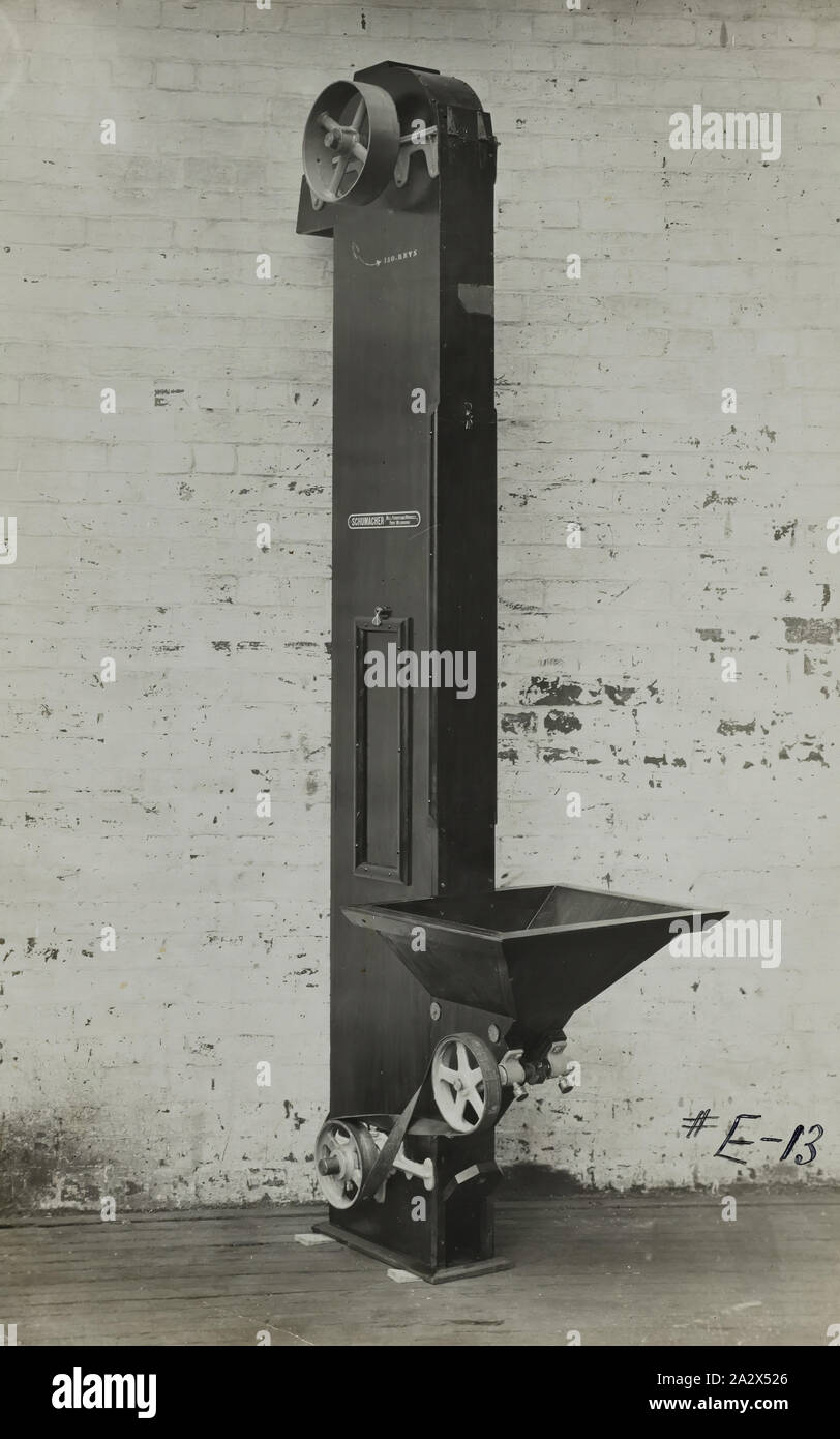 Photograph - Schumacher Mill Furnishing Works, Elevator with Mixer, Port Melbourne, Victoria, 1919, Black and white promotional image of an elevator. It is part of a collection of photographs and marked printer's copy used in the preparation of trade literature promoting products manufactured by the Schumacher Mill Furnishing Works Pty Ltd. The items were originally housed in a wooden filing drawer Stock Photo