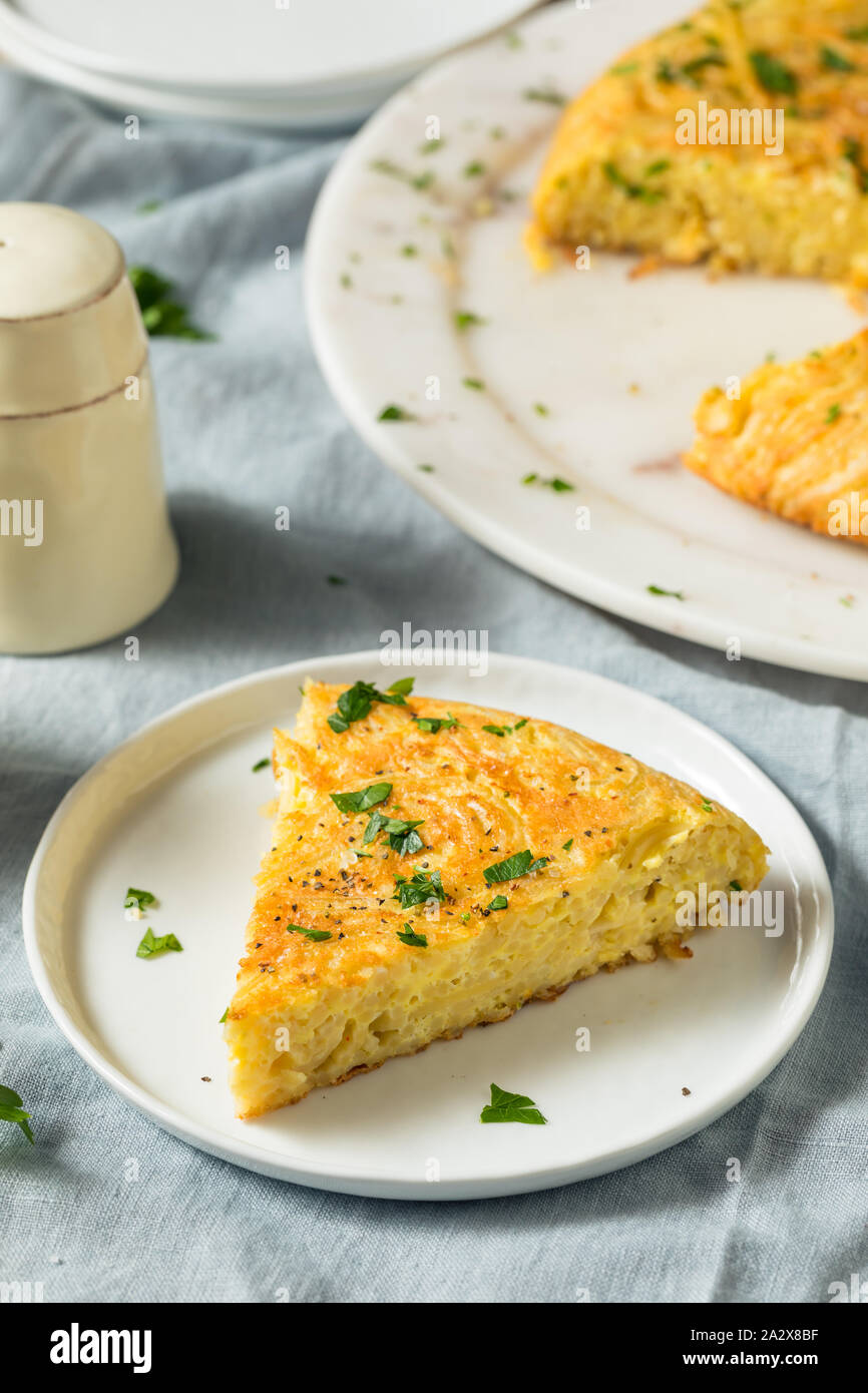 Homemade Spaghetti Omelette with Eggs and Parsley Stock Photo