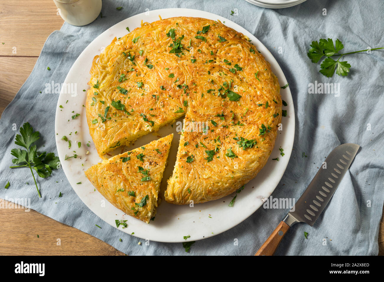 Homemade Spaghetti Omelette with Eggs and Parsley Stock Photo