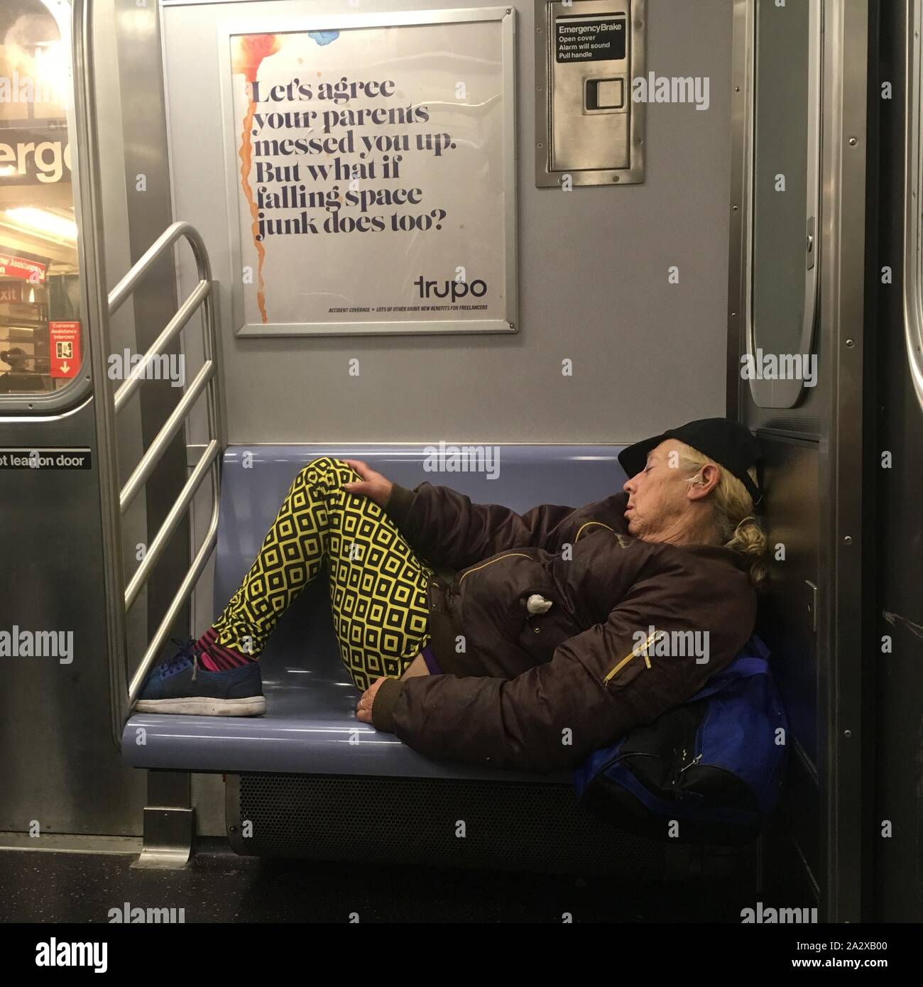 A woman sleeping on a train hi-res stock photography and images - Alamy