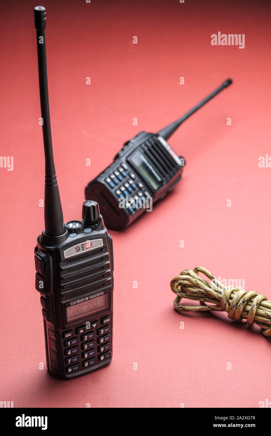 Two way hand held walkie talky radios. Commonly used for public service, business, and personal communications. Stock Photo