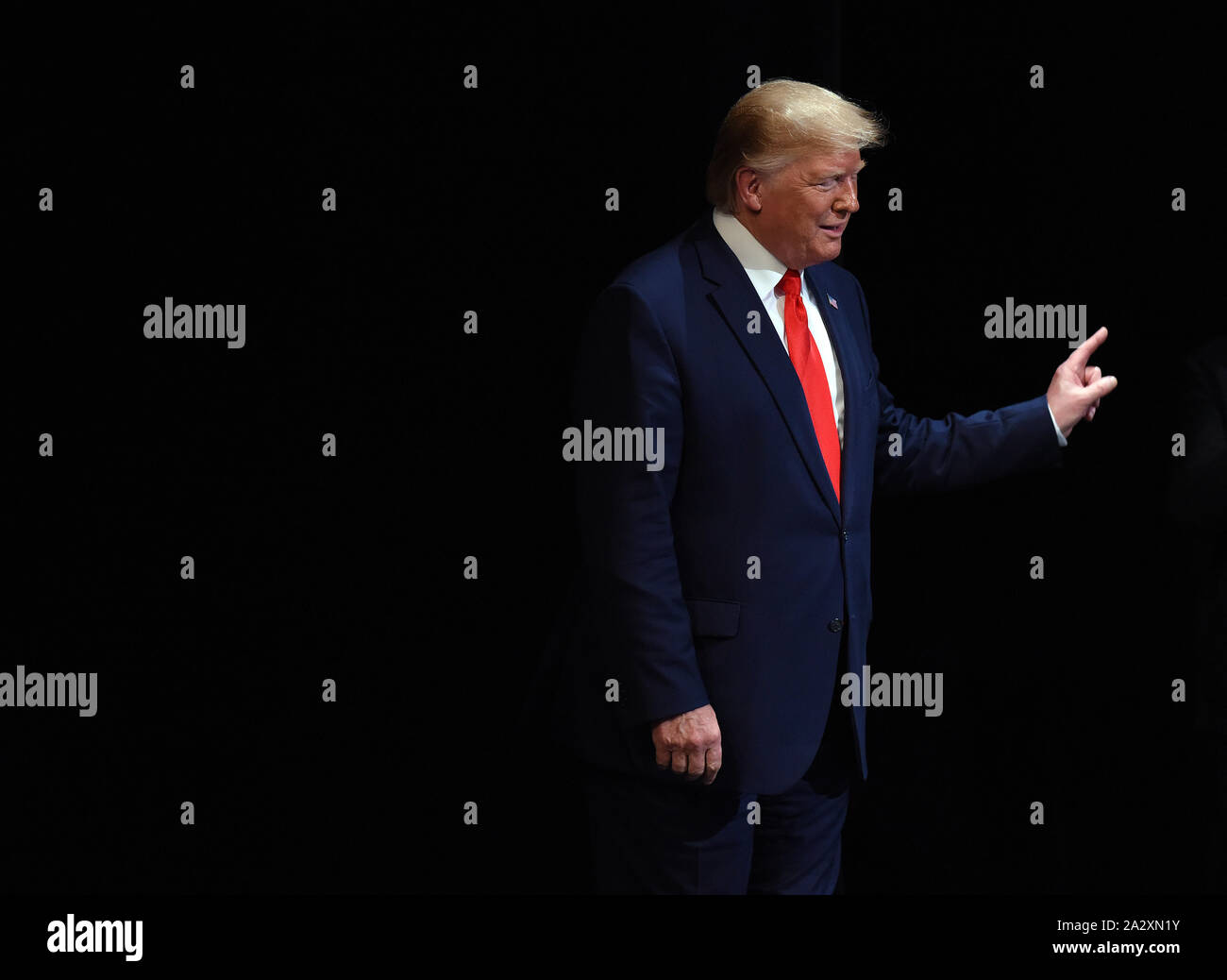 The Villages, United States. 03rd Oct, 2019. U.S. President Donald Trump gestures to supporters after giving remarks on his administration's health policy and signing an executive order regarding Medicare at the Sharon L. Morse Performing Arts Center on October 3, 2019 in The Villages, Florida. Credit: Paul Hennessy/Alamy Live News Stock Photo