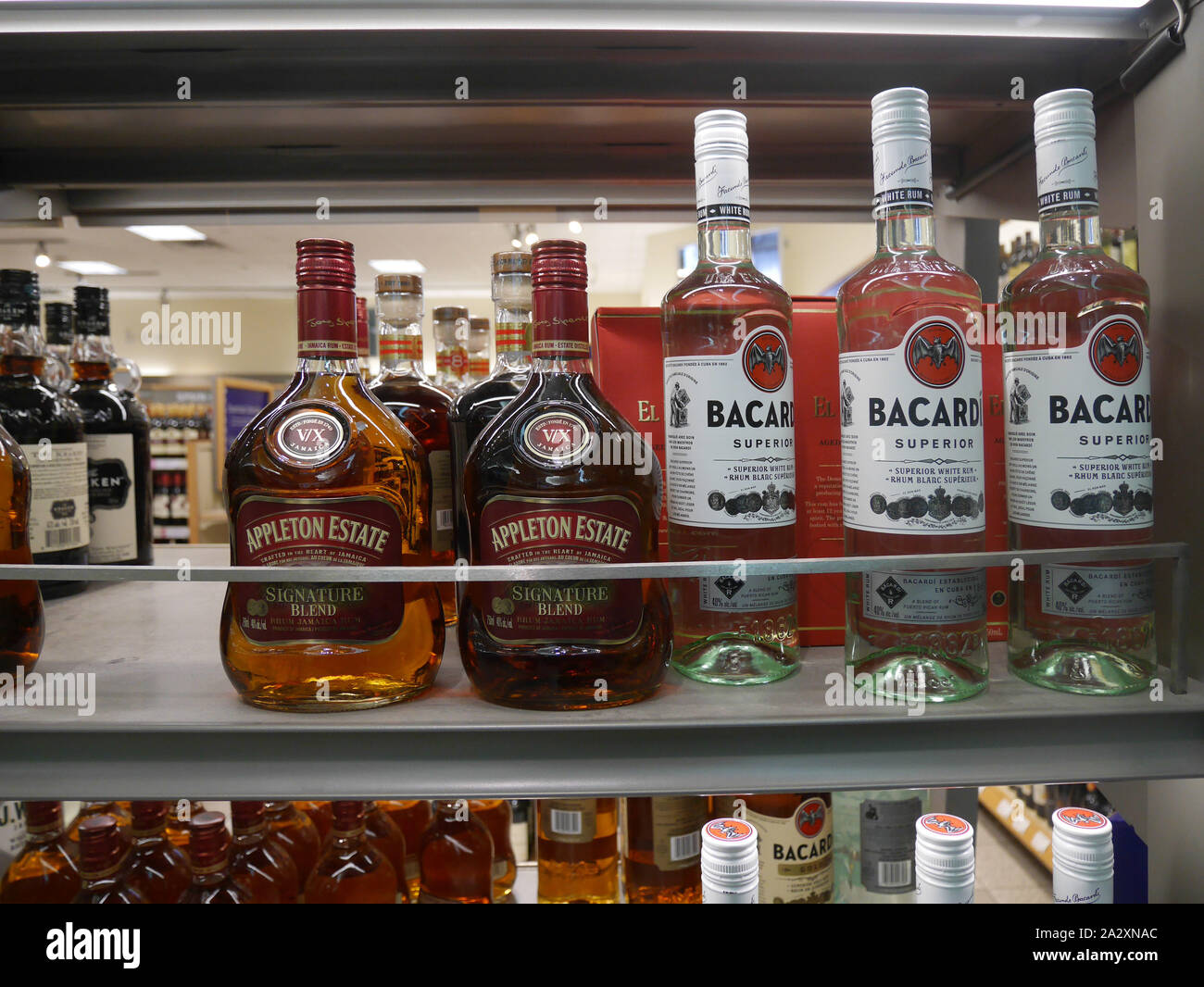 Shelf of bottles of liquor in a specialty liquor store Stock Photo
