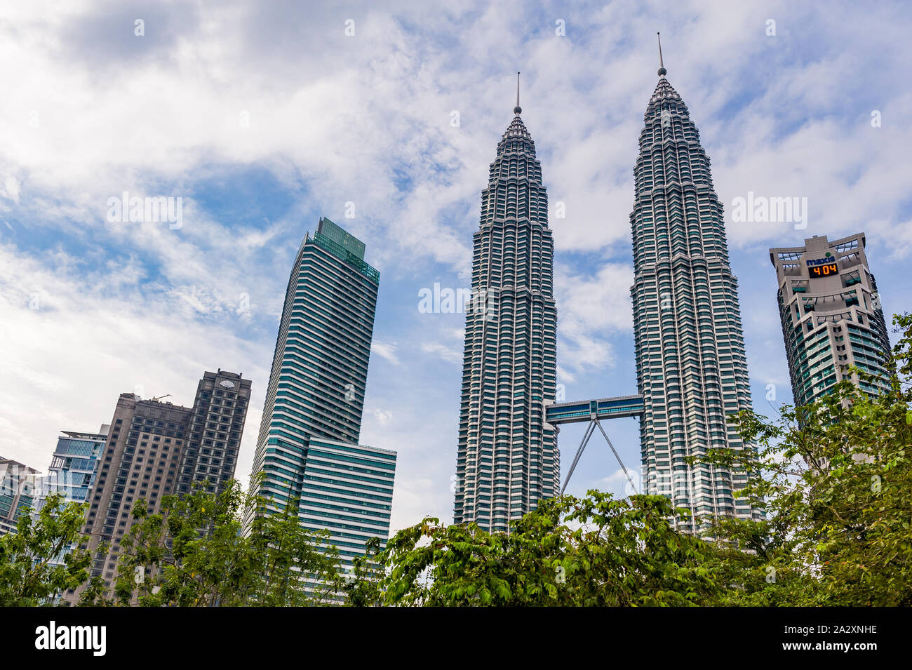 Kuala Lumpur, Malaysia, 17 Nov 2013: Famous landmark towering Petronas Twin Towers with blue sky. Stock Photo