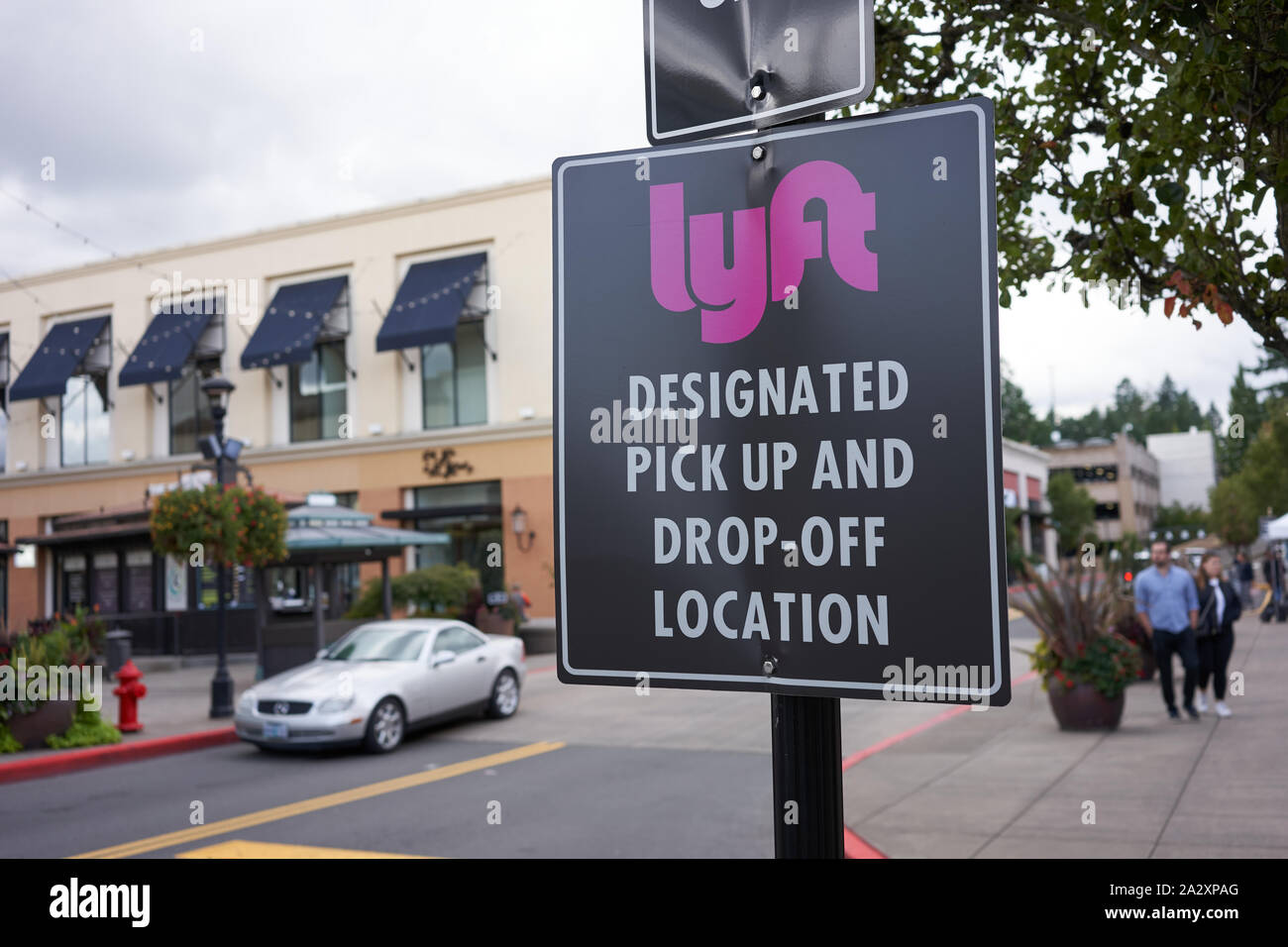Tigard, Oregon, USA - Sep 28, 2019: A Lyft designated pick up and drop-off location sign is seen at Bridgeport Shopping Center in Tigard, Oregon. Stock Photo