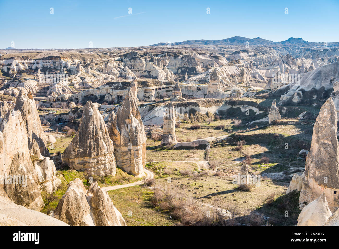 Aerial view of various rocks and Cave hotel in the valley of Goreme ...