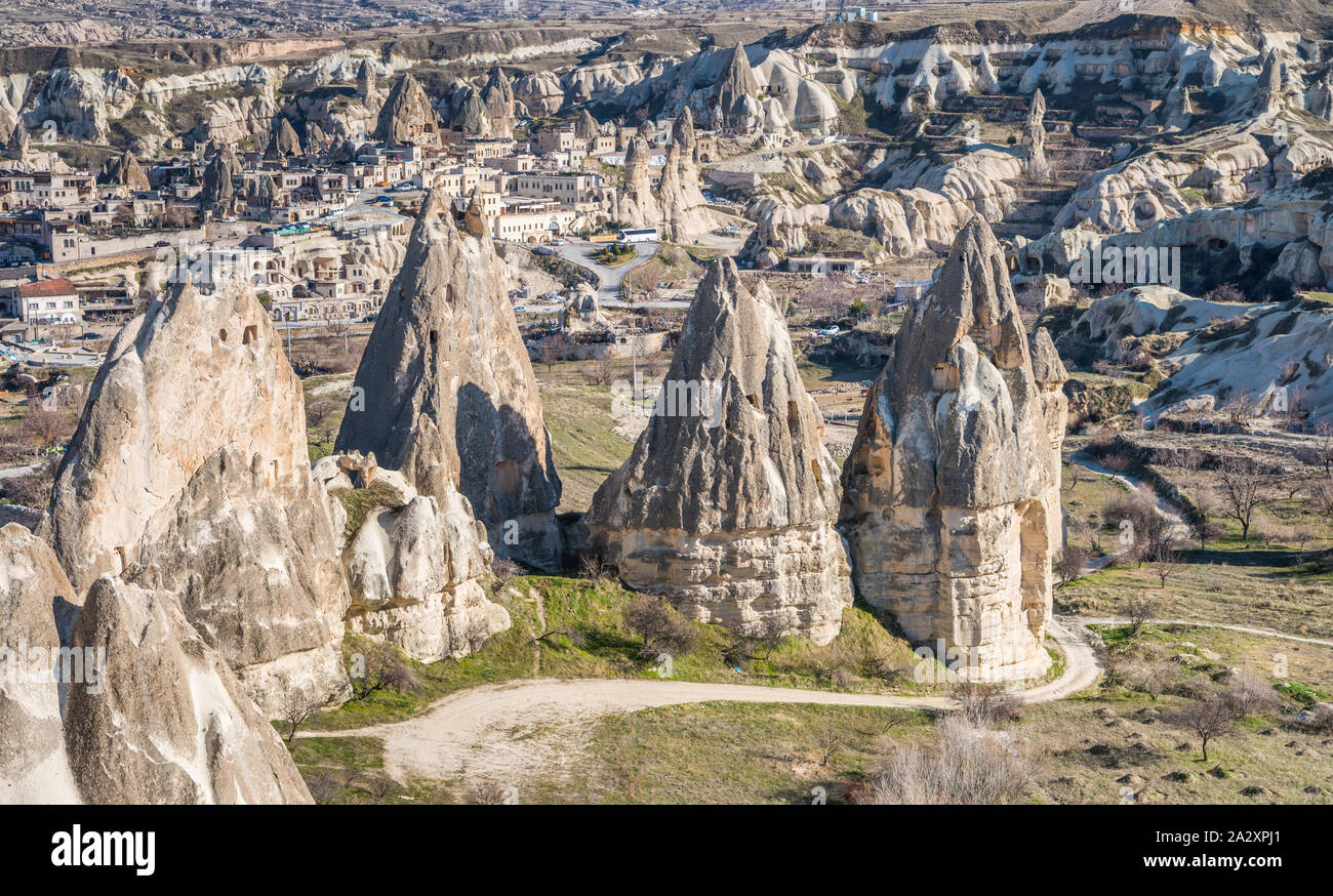 Aerial view of various rocks and Cave hotel in the valley of Goreme in ...