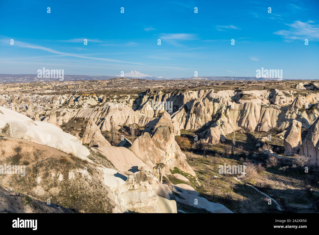 Aerial view of various rocks and Cave hotel in the valley of Goreme ...